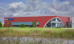 Picture of Eagle Performance Plastics building from highway